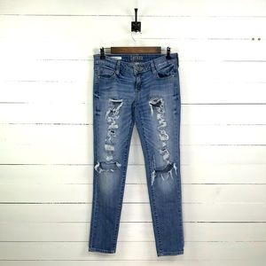 Distressed Decree Super Skinny Jeans